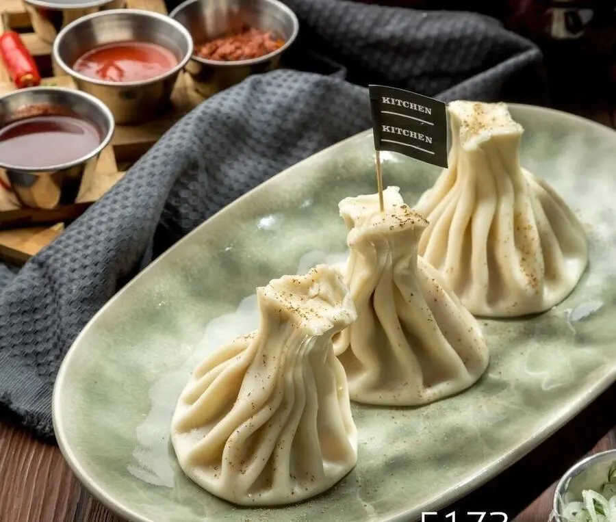Хинкали с курицей в сливочном соусе