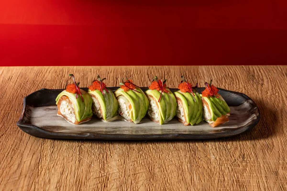 Roll with salmon, crab and avocado