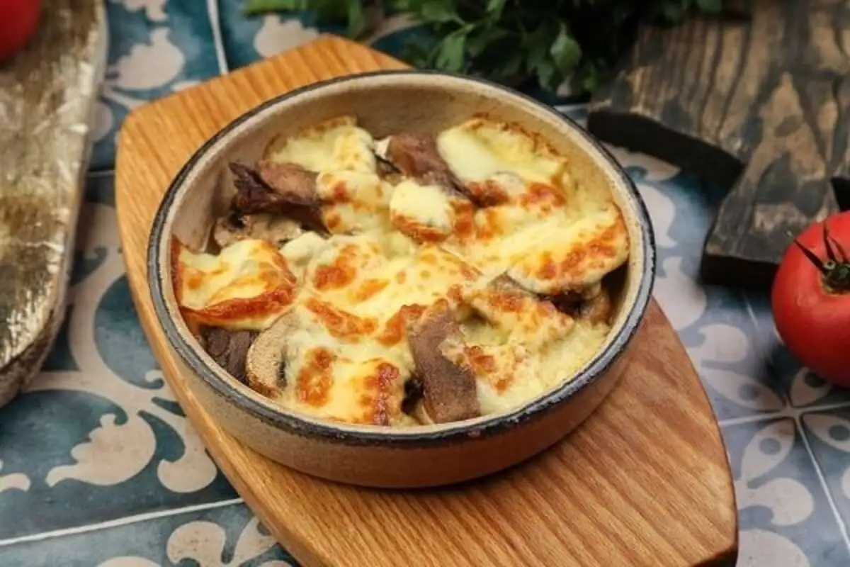 Шампиньоны с языком на кеци