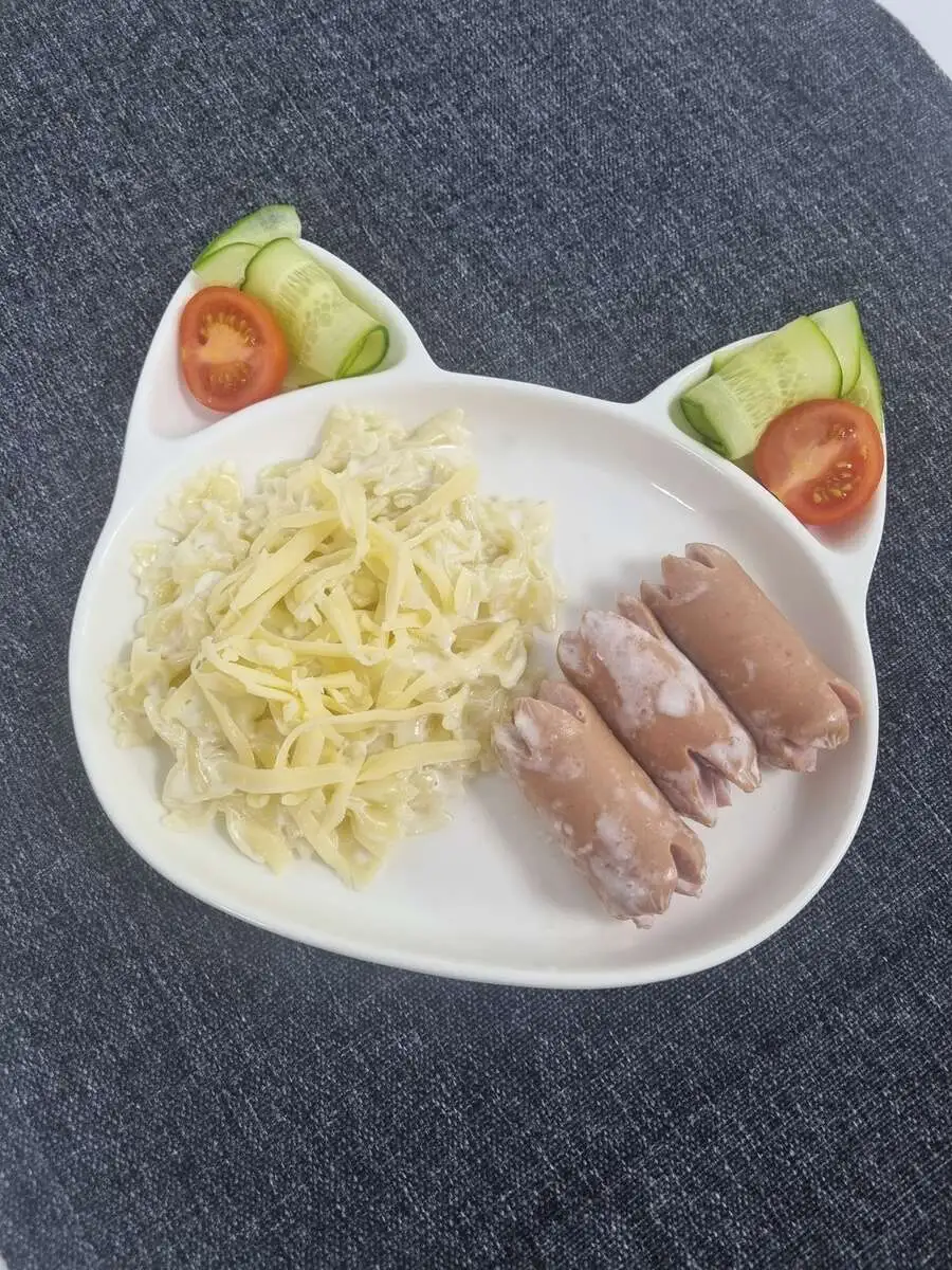 Макароны с сосисками в сливочном соусе